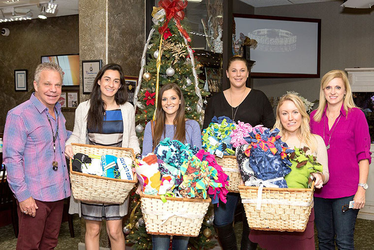 1 Laser Locators Employees Deliver Blankets to Steve Julie Weintraub to benefit Hands Across the Bay Our Community