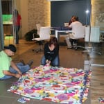 It is all hands on deck as the team finds ways to get their blankets made. 150x150 Hands Across the Bay