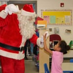 Santa was so delighted to be greeted with a big high five from one of his fans. 150x150 Potter Elementary School